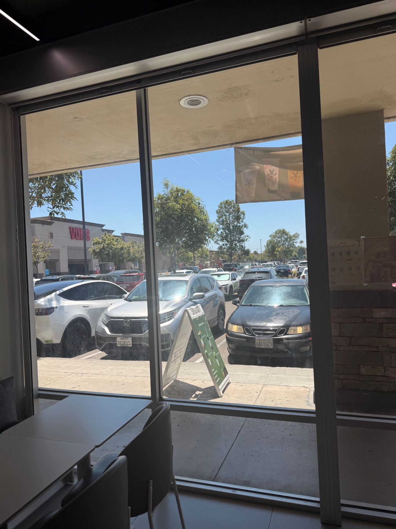 Before — Storefront interior glass